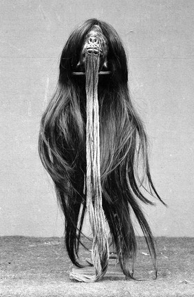 A shrunken head. Photograph, 19--.