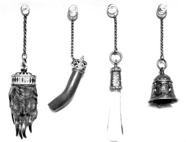 M0016751: De Osma family hierlooms: badger's paw, coral & enamelled gold bell, 17th century