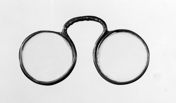 Eye-glasses. Horn-rims, bridge metal wrapped, with horn or leather, probably French.