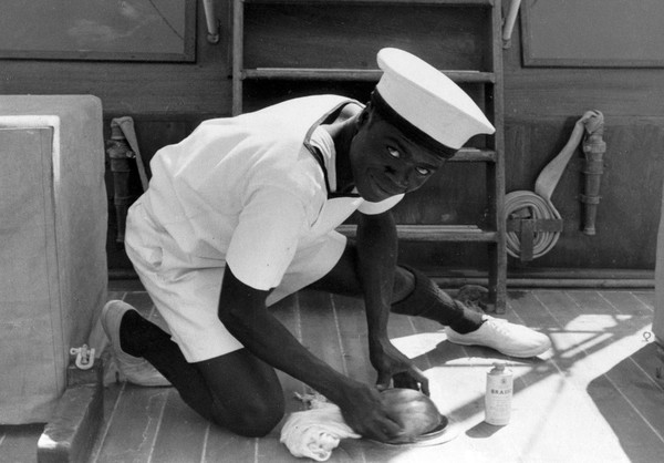 M0017408: Plaque on board the laboratory ship, the "Lady Dale" / M0017409: A crew member on board the laboratory ship the "Lady Dale"