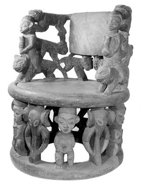 Seat supported by standing figures and elephant heads, the back of leopards, with 2 figures riding leopards as side supports. Grasslands, possibly Bali, Cameroons, West Africa.