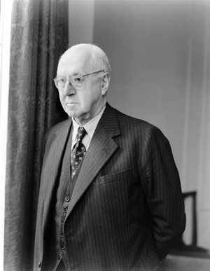 view Portrait of Sir Henry Dale, seated at desk facing camera