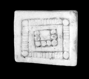 view Amuletic objects of stone to ensure fertility, Bolivia. In the form of square plaques, decorated.