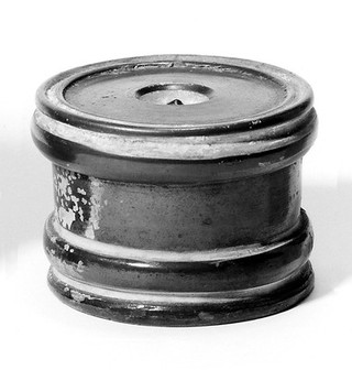 Greek pyxis (for holding ointment), black glaze on red ware