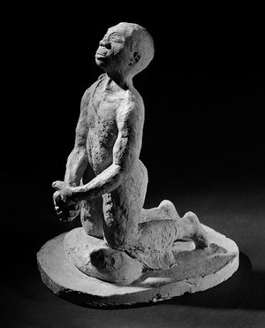 view Terracotta representation of a kneeling peasant, Africa.