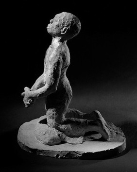 Terracotta representation of a kneeling peasant, Africa.