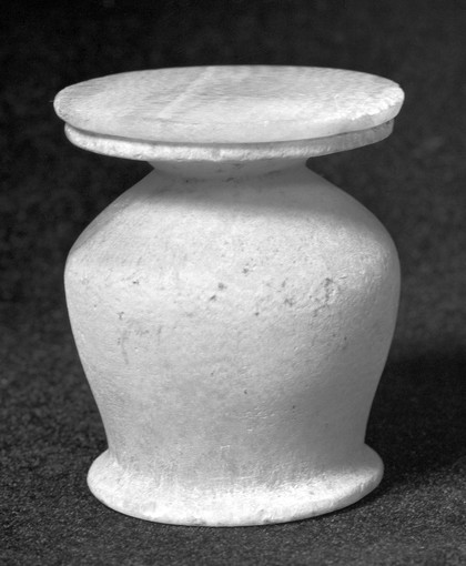 Egyptian alabaster kohl pot. From a 12th dynasty tomb. Number 516 at Abydos. Professor Garstang's excavations, 1908. From the collection of the Reverend William MacGregor, Tamworth.