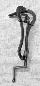 M0019321: Two three-bladed specula: one Roman bronze, the other 17th century steel