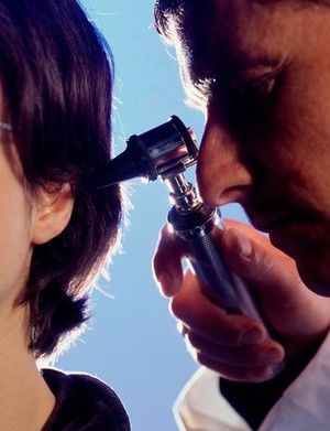 view Ear examination using auriscope