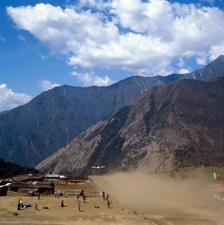 Nepal; air transport in the Khumbu, 1986. As N0022554C with aircraft taking off above the