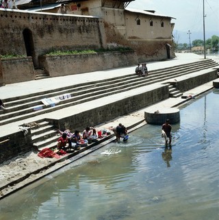 Nepal; washing clothes in the Baghmati river, 1986