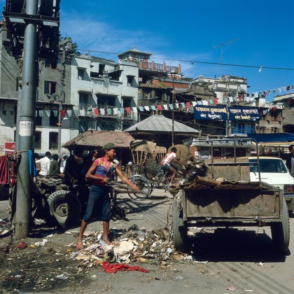 Nepal; street cleaning in Kathmandu, 1986. In the mid-1980s, Kathmandu was a mix of medieval architecture and urban sprawl. Television was a late-comer to Nepal but by the 1980s, the skyline of urban areas had become peppered with television aerials. Copying western culture and values became fashionable, and drug addiction amongst the young increased significantly during the decade.
