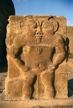 view Egyptian carving, dwarf demon Bes, taken 1989