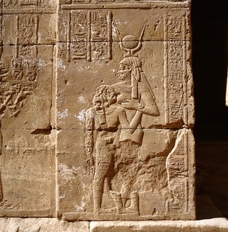 Goddess Isis feeding Horus, wall relief