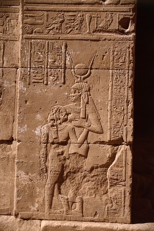 view Goddess Isis feeding Horus, wall relief