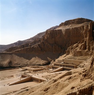 Mortuary temple of Queen Hatshepsut (reigned 1498-1483 BCE, dynasty XVIII), Deir el-Bahri, Thebes. The temple is a partly rock-cut and partly free-standing terraced structure. during the Graeco-Roman Period (332 BCE - CE 395) the temple became a centre for healing and the upper terrace was consecrated to Imhotep. Numerous graffiti are evidence of the large number of invalids who visited it until the second century CE.