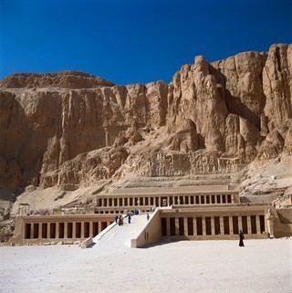 Mortuary temple of Queen Hatshepsut (reigned 1498-1483 BCE, dynasty XVIII), Deir el-Bahri, Thebes. The temple is a partly rock-cut and partly free-standing terraced structure. during the Graeco-Roman Period (332 BCE - CE 395) the temple became a centre for healing and the upper terrace was consecrated to Imhotep. Numerous graffiti are evidence of the large number of invalids who visited it until the second century CE.