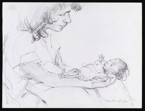 view Nurse holding a premature baby