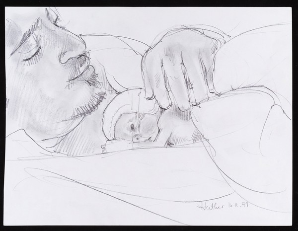 Father with his premature baby