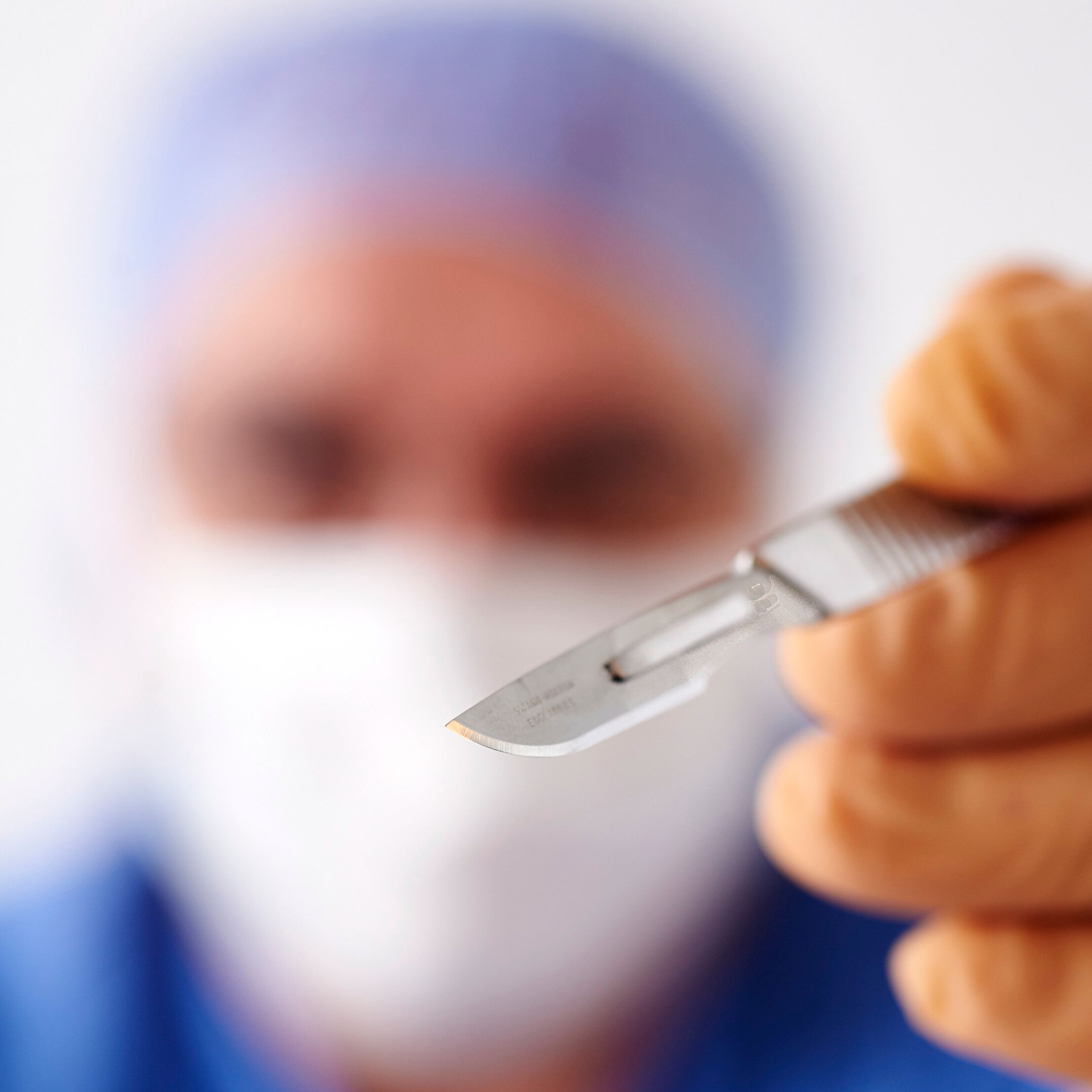White male surgeon with scalpel Collection