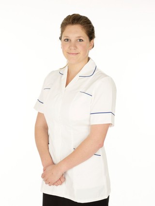 Young white female health professional in uniform. 
