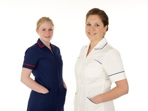 view Two young white female health professionals in uniform
