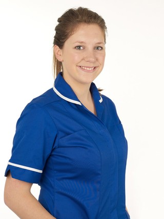 Young white female health professional in uniform. 