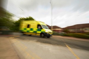 view Ambulance on route to an emergency call out, UK.