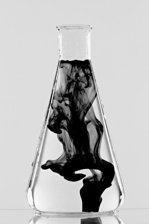 view Conical flask with black liquid