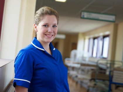 Young white female health professional in uniform. 