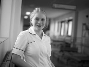 view Young white female health professional in uniform. 