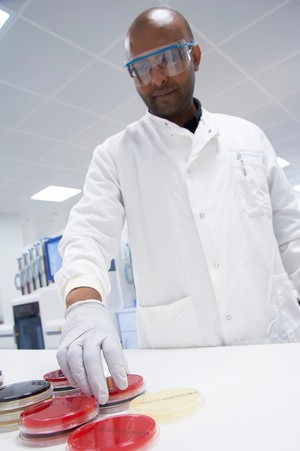 view Young male scientist in a laboratory