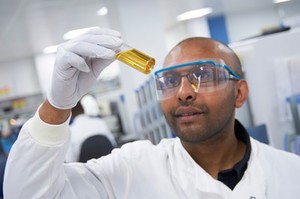 view Young male scientist in a laboratory