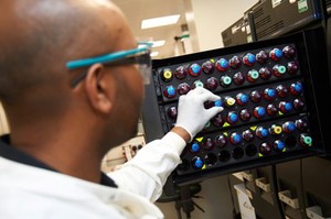 view Young male scientist in a laboratory