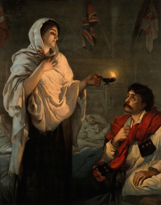 Crimean War: Florence Nightingale with her lamp at a patient's bedside. Colour lithograph, 1891, after H. Rae.