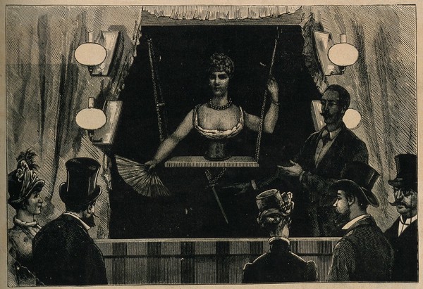 A woman being exhibited, supposedly with no lower half of her body. Wood engraving.