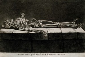 view A skeleton, lying supine on a stone slab. Etching by or after J. Gamelin, 1778/1779.