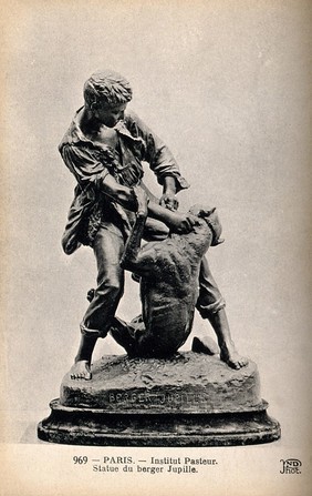 A boy struggling with a rabid dog. Reproduction of a photograph.
