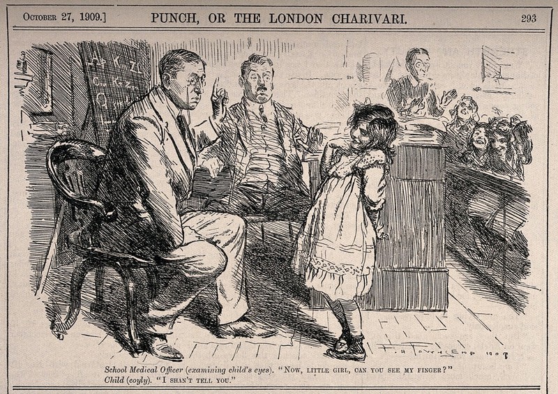 A school medical officer trying to give a child an eye-test in front of a classroom of children. Wood engraving by F.H. Townsend, 1909., 1909, by F. H. Townsend