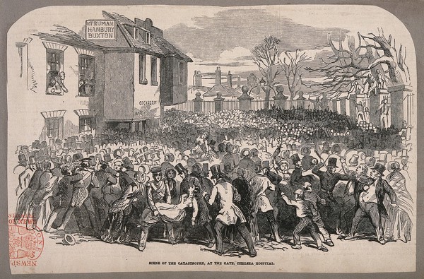 The Royal Hospital, Chelsea: a large crowd outside the wall with constables struggling to keep order. Wood engraving.