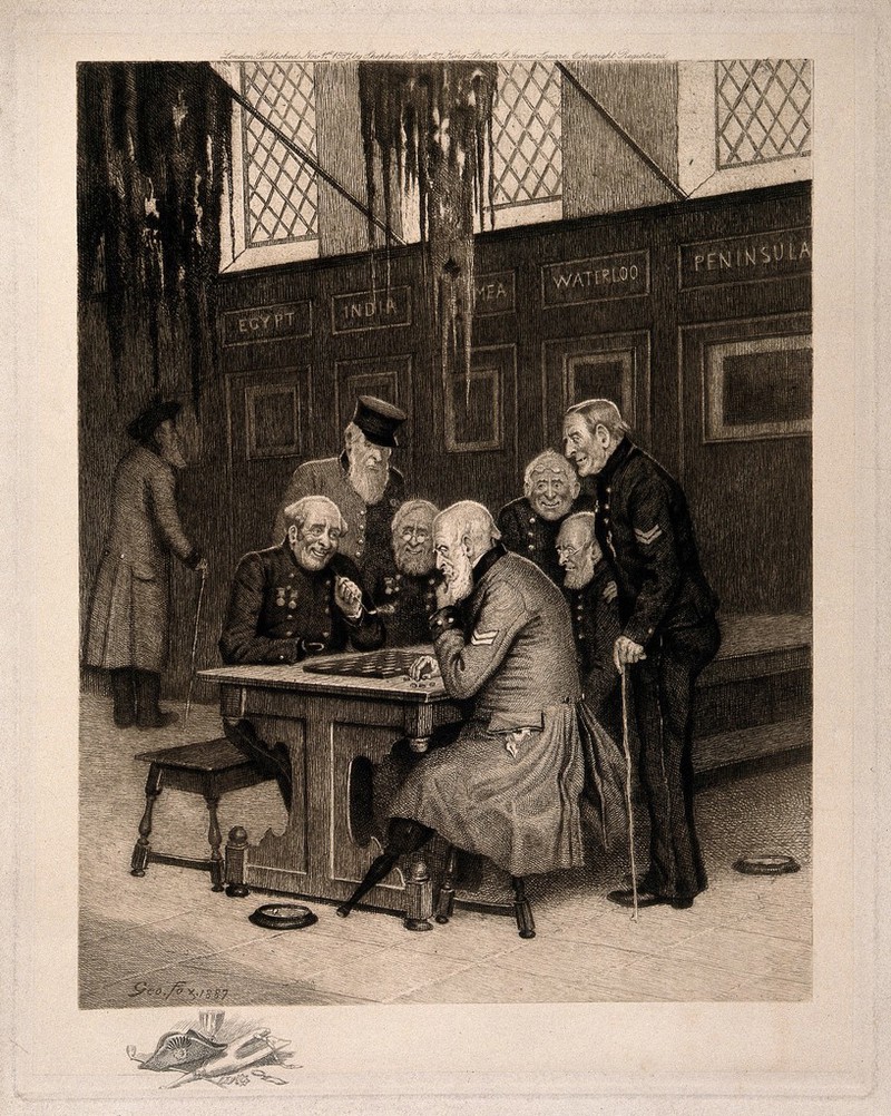 A pair of Pensioners, seated at a table, playing draughts, with others looking on, inside the Royal Hospital, Chelsea, with a vignette of tricorn hat, wooden leg, clay pipe, drinking glass and medals at lower left. Etching by G. Fox, 1887., 1887, by George Fox