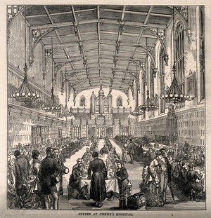 view Christ's Hospital, London: the interior of the Hall with boys eating and adults looking on. Wood engraving, 1862.