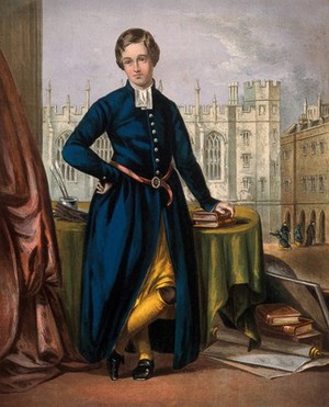 view Christ's Hospital, London: one of the boys standing beside a table, his hand on some books, the exterior of the New Hall behind. Colour lithograph after J. Cristall.