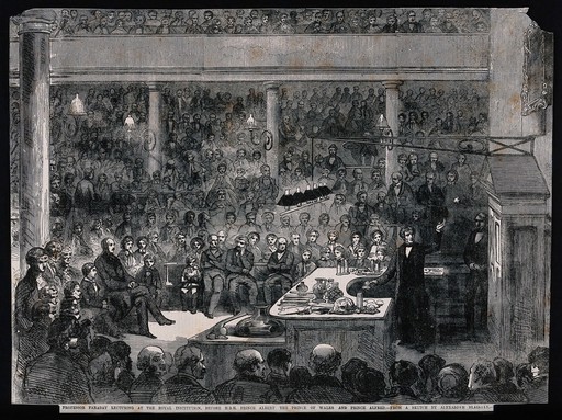 Michael Faraday lecturing at the Royal Institution: Prince Albert and his sons in the audience. Wood engraving, 1856, after A. Blaikley.