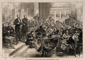 view Two men entertain the deaf and dumb in sign language at the Freemason's Tavern. Wood engraving.