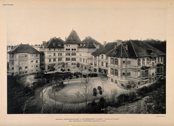 Hôpital Ophtalmologique A. de Rothschild, Paris: three-quarter view of the building facing the garden. Process print, 1913.