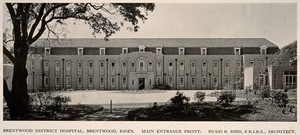 view Brentwood District Hospital, Essex: the entrance facade. Process print, 1929.