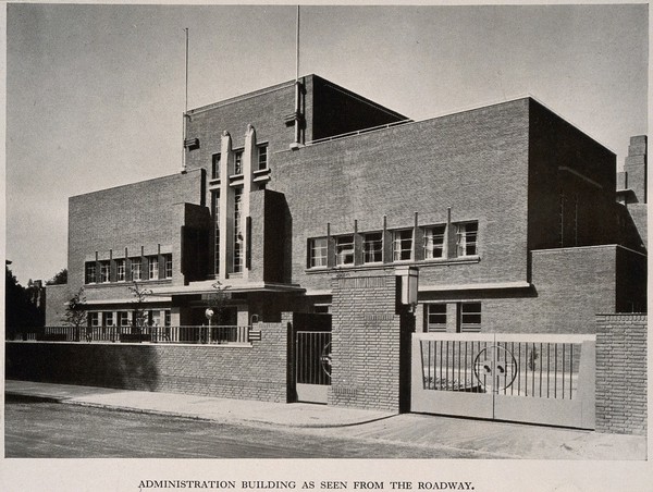 Royal Masonic Hospital, London: three-quarter view of the administrative block. Process print, 1933.