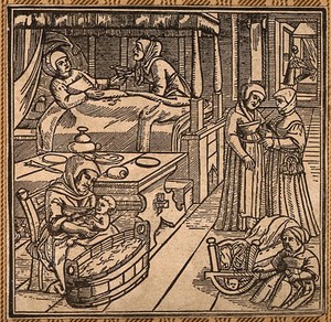 view A woman in bed recovering from childbirth, a midwife washes the baby while another attendant looks after the mother. Woodcut.