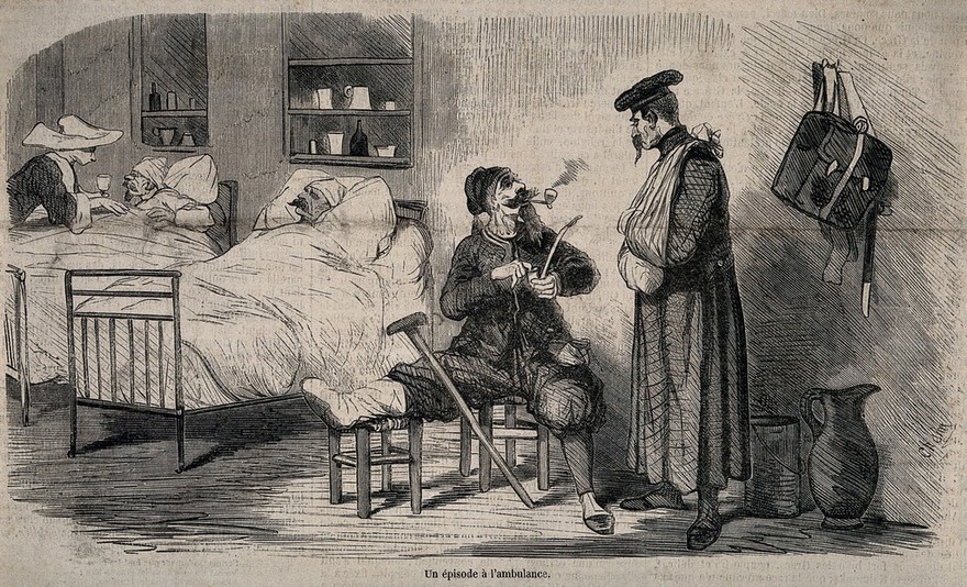 A ward in a military hospital showing two convalescents and two bed-ridden patients. Wood engraving after Cham, 1870.